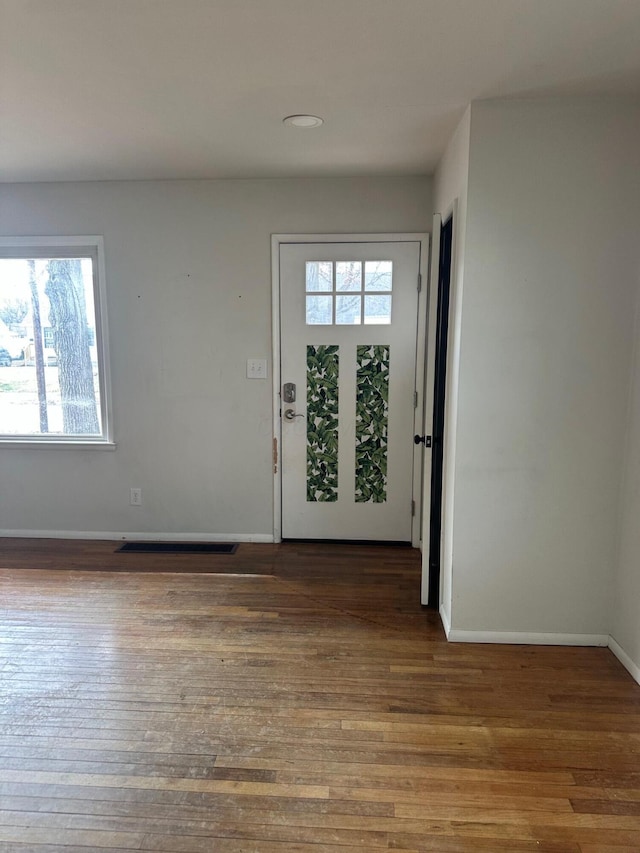 3434 Kenlawn St, Columbus, OH 43224 - foyer featuring baseboards and wood finished floors