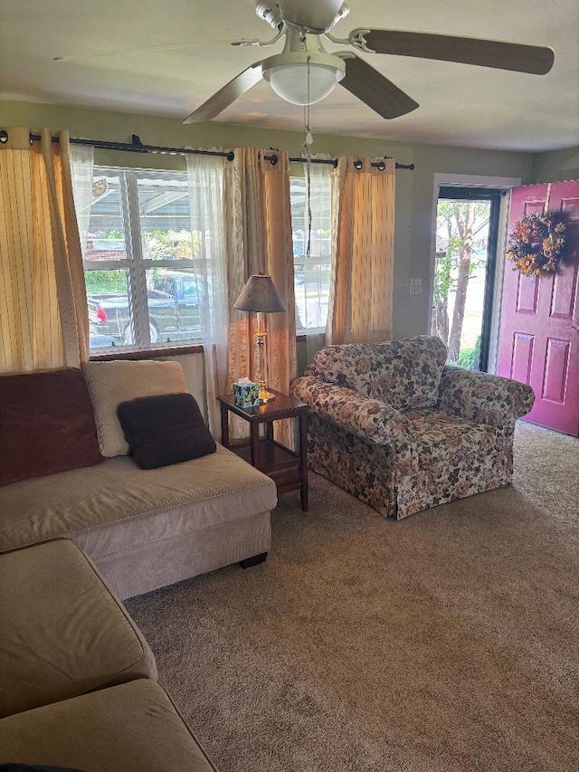 909 Stephen Dr W, Columbus, OH 43204 - carpeted living area with ceiling fan