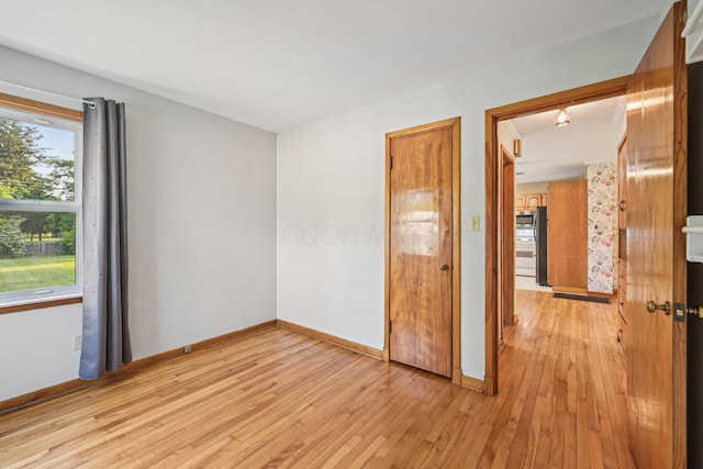 640 Wetmore Rd, Columbus, OH 43214 - empty room featuring light wood-style flooring and baseboards