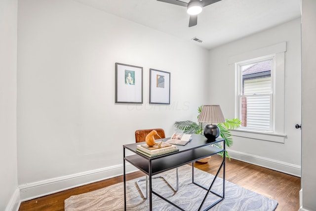 976 Oakwood Ave, Columbus, OH 43206 - office space with baseboards, wood finished floors, and a ceiling fan