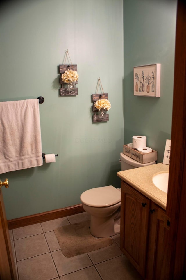 350 S Houston Pike, South Vienna, OH 45369 - half bath featuring vanity, toilet, tile patterned flooring, and baseboards