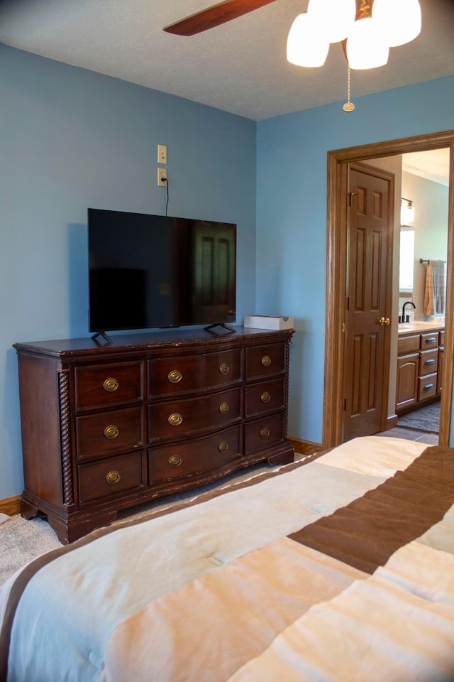 350 S Houston Pike, South Vienna, OH 45369 - bedroom featuring baseboards, a ceiling fan, and a sink