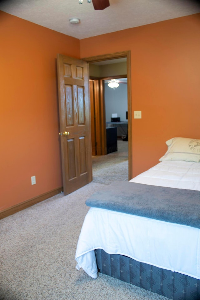 350 S Houston Pike, South Vienna, OH 45369 - bedroom with carpet floors, baseboards, and ceiling fan