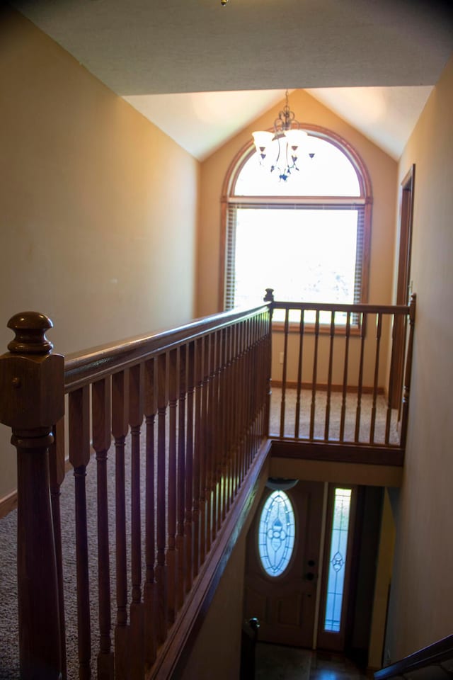 350 S Houston Pike, South Vienna, OH 45369 - staircase featuring vaulted ceiling, a chandelier, and plenty of natural light