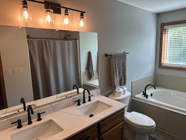 350 S Houston Pike, South Vienna, OH 45369 - bathroom with toilet, a garden tub, double vanity, a shower with shower curtain, and a textured ceiling