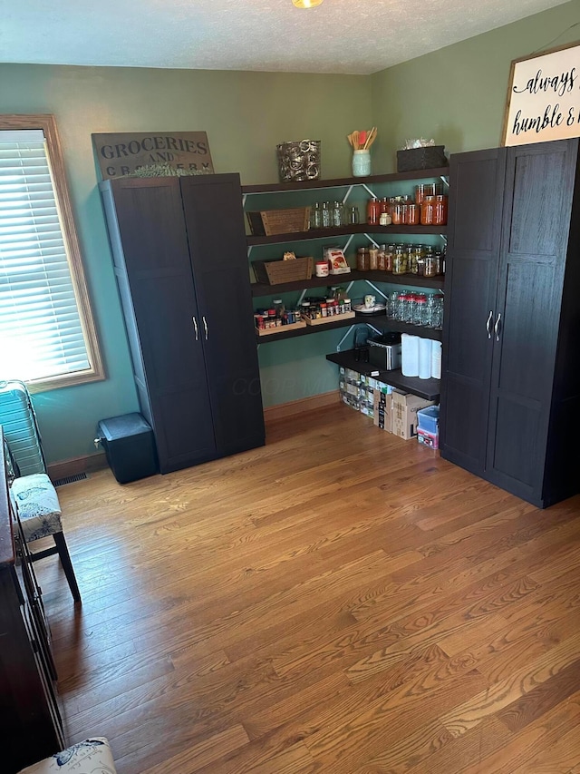 350 S Houston Pike, South Vienna, OH 45369 - office area with wood finished floors and a textured ceiling