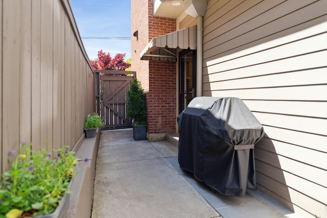 48 E 4th Ave, Columbus, OH 43201 - view of patio / terrace featuring a gate and a grill
