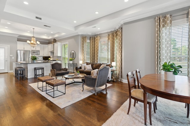 48 E 4th Ave, Columbus, OH 43201 - living room with a chandelier, dark wood-style floors, baseboards, recessed lighting, and a tray ceiling
