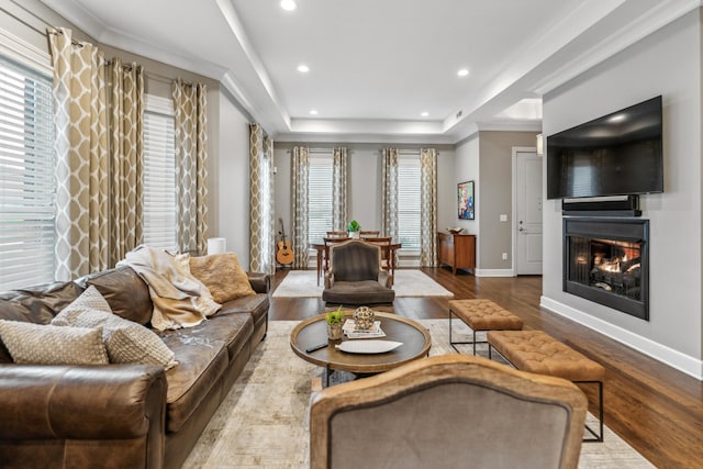 48 E 4th Ave, Columbus, OH 43201 - living area featuring a glass covered fireplace, wood finished floors, healthy amount of natural light, recessed lighting, and baseboards