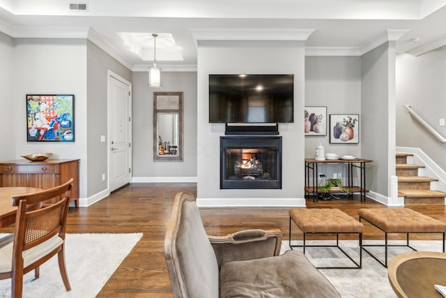 48 E 4th Ave, Columbus, OH 43201 - living area with wood finished floors, stairs, baseboards, ornamental molding, and a lit fireplace