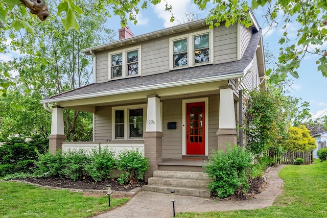 1206 Willard Ave, Columbus, OH 43212 - traditional style home with a chimney, a porch, a shingled roof, and a front yard