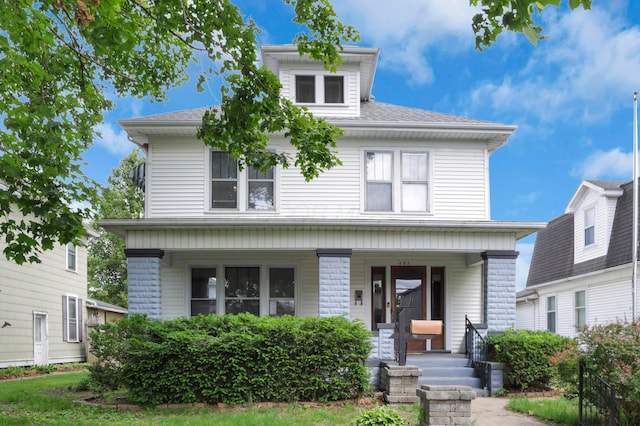 683 E 2nd St, Chillicothe, OH 45601 - american foursquare style home featuring covered porch