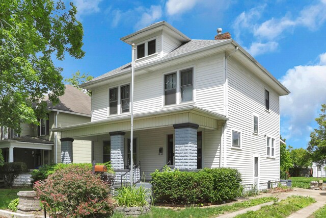 683 E 2nd St, Chillicothe, OH 45601 - traditional style home with a chimney, a porch, and a shingled roof
