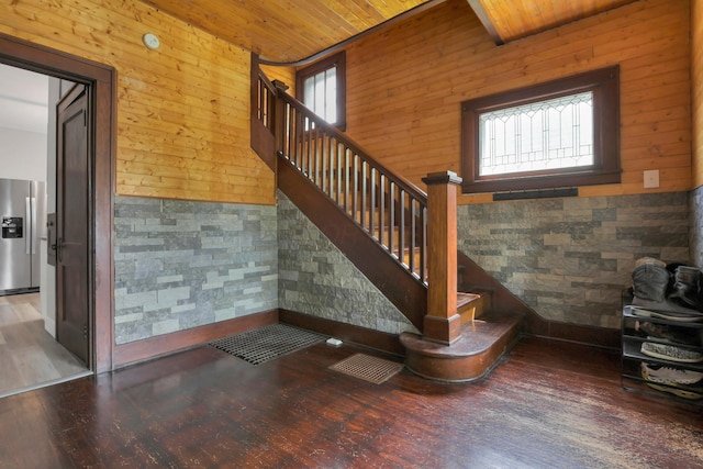 683 E 2nd St, Chillicothe, OH 45601 - staircase with wood ceiling, plenty of natural light, wood finished floors, and wood walls