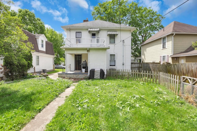 683 E 2nd St, Chillicothe, OH 45601 - rear view of house featuring a chimney and a patio