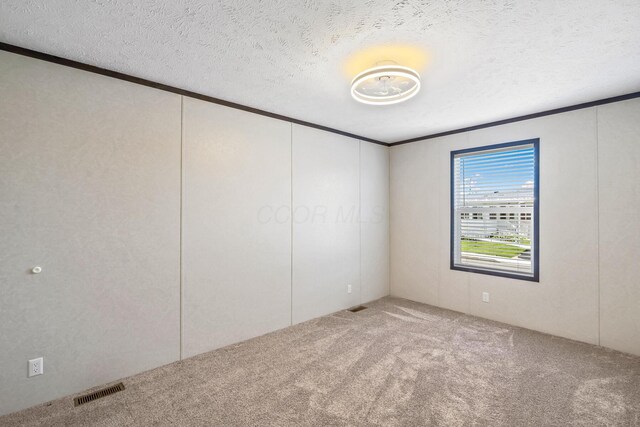 50 Winter Pine Dr, Delaware, OH 43015 - carpeted spare room with ornamental molding