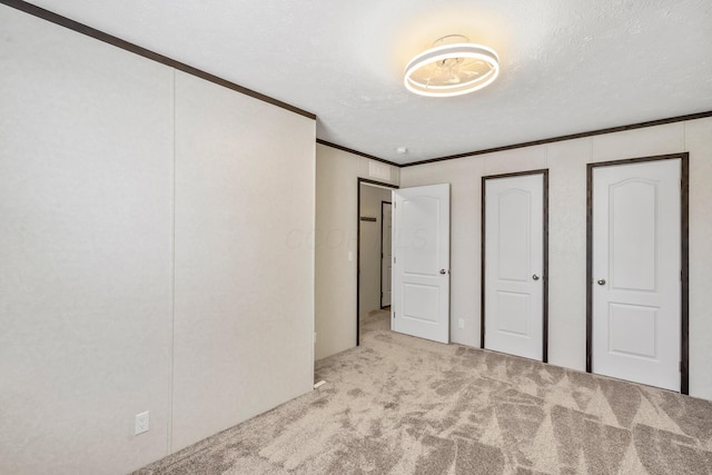 50 Winter Pine Dr, Delaware, OH 43015 - unfurnished bedroom featuring carpet and crown molding