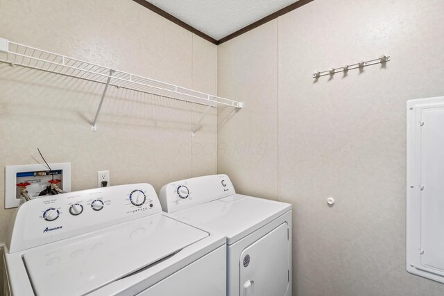 50 Winter Pine Dr, Delaware, OH 43015 - washroom featuring separate washer and dryer, ornamental molding, and electric panel