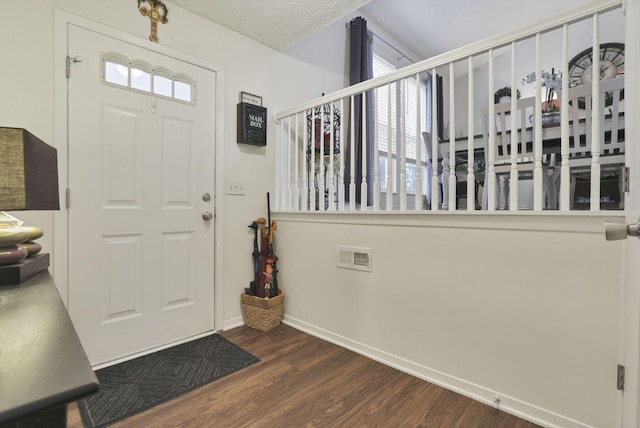 7400 Olympic Club Ct, Pickerington, OH 43147 - foyer featuring baseboards and dark wood-style flooring