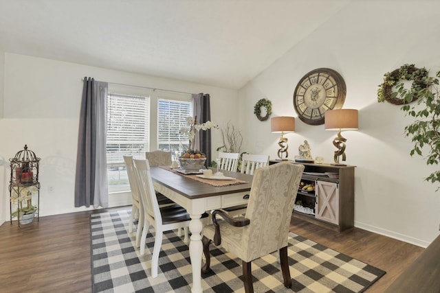 7400 Olympic Club Ct, Pickerington, OH 43147 - dining space with dark wood-style floors, vaulted ceiling, and baseboards