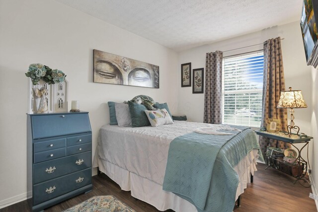 7400 Olympic Club Ct, Pickerington, OH 43147 - bedroom featuring dark wood-type flooring and a textured ceiling