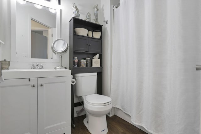 7400 Olympic Club Ct, Pickerington, OH 43147 - bathroom with toilet, wood finished floors, vanity, and curtained shower