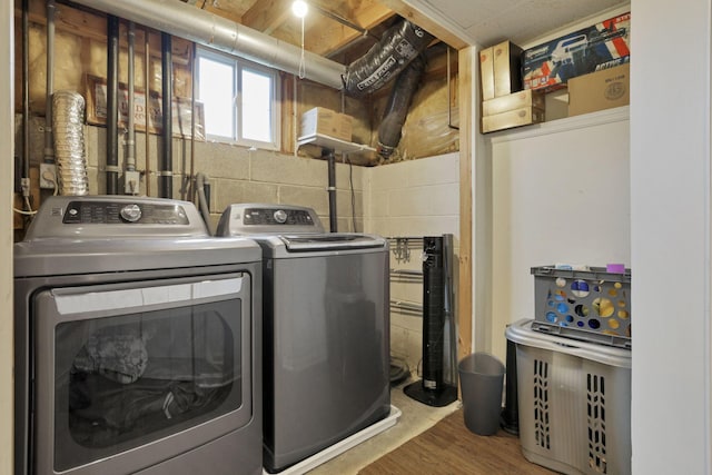 7400 Olympic Club Ct, Pickerington, OH 43147 - washroom featuring washing machine and dryer and wood finished floors