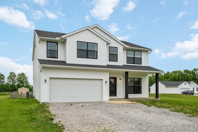 4483 County Road 124, Cardington, OH 43315 - view of front facade with a porch, central AC, driveway, an attached garage, and a front lawn