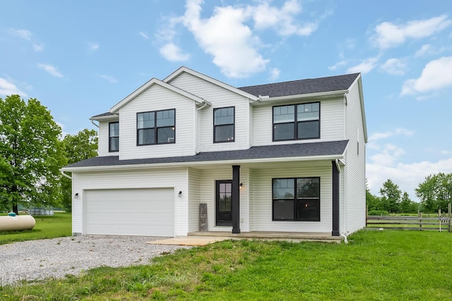 4483 County Road 124, Cardington, OH 43315 - view of front of house with a porch, driveway, and an attached garage
