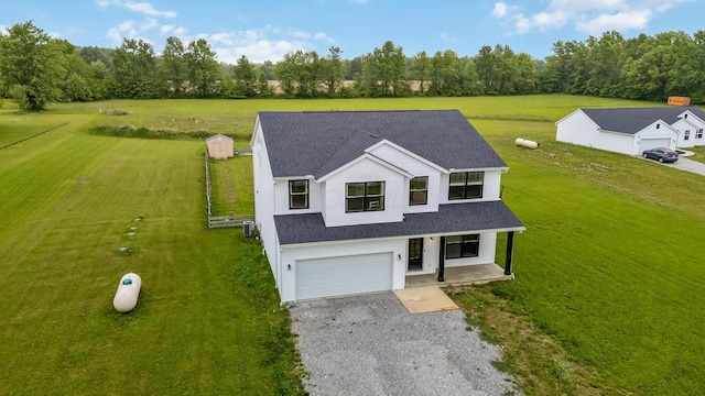 4483 County Road 124, Cardington, OH 43315 - view of front of house featuring driveway, an attached garage, and a front yard