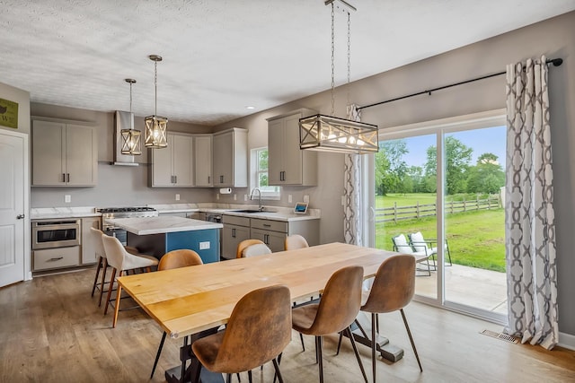 4483 County Road 124, Cardington, OH 43315 - dining space with a chandelier, light wood-style floors, and recessed lighting