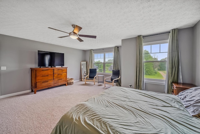 4483 County Road 124, Cardington, OH 43315 - bedroom with carpet floors, a textured ceiling, baseboards, and a ceiling fan