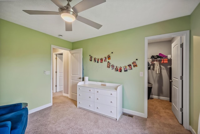 4483 County Road 124, Cardington, OH 43315 - bedroom featuring light carpet, a walk in closet, and baseboards