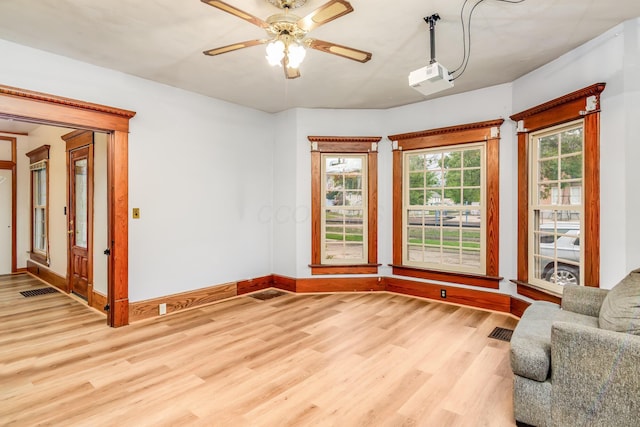 302 Oak St, Mount Vernon, OH 43050 - sitting room featuring light wood-style flooring, baseboards, and ceiling fan