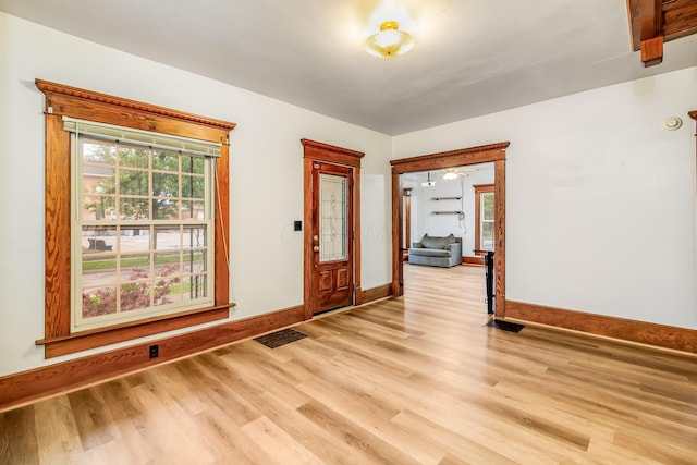 302 Oak St, Mount Vernon, OH 43050 - foyer entrance with light wood-style floors and baseboards
