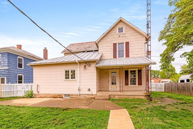 302 Oak St, Mount Vernon, OH 43050 - view of front of house with a standing seam roof, a porch, metal roof, and a patio area