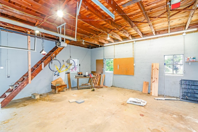 302 Oak St, Mount Vernon, OH 43050 - garage with a garage door opener and concrete block wall