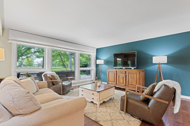 5518 Aryshire Ct, Dublin, OH 43017 - living room featuring healthy amount of natural light, wood finished floors, and baseboards
