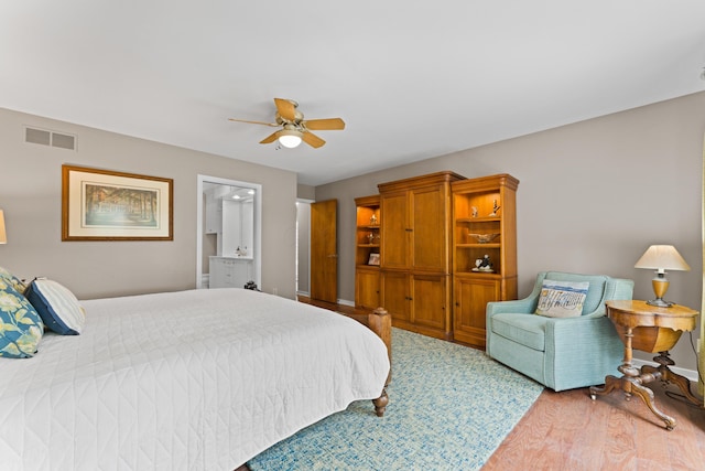 5518 Aryshire Ct, Dublin, OH 43017 - bedroom with light wood finished floors, ceiling fan, baseboards, and ensuite bathroom