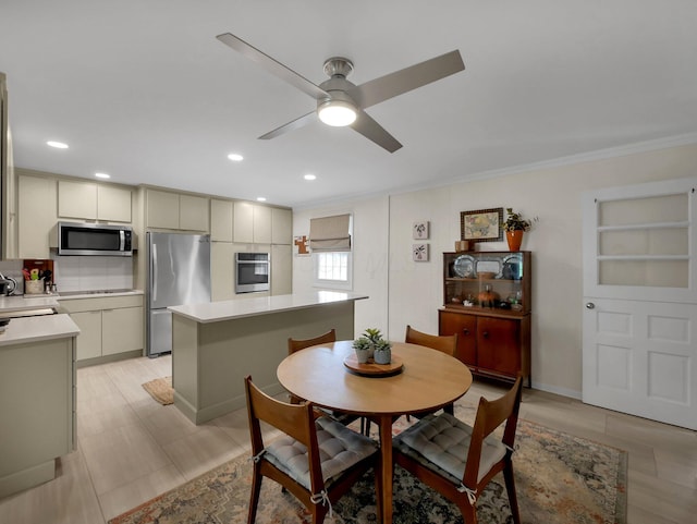 954 Circle Dr, Circleville, OH 43113 - dining space featuring crown molding, ceiling fan, and recessed lighting