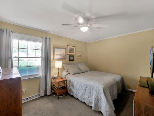 954 Circle Dr, Circleville, OH 43113 - carpeted bedroom with a ceiling fan, crown molding, and baseboard heating