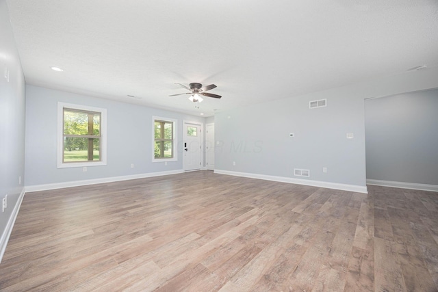 1674 Brock Rd NE, Bloomingburg, OH 43106 - unfurnished room with a ceiling fan, wood finished floors, baseboards, and recessed lighting