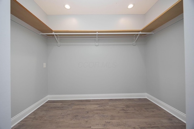 1674 Brock Rd NE, Bloomingburg, OH 43106 - spacious closet featuring dark wood-style flooring