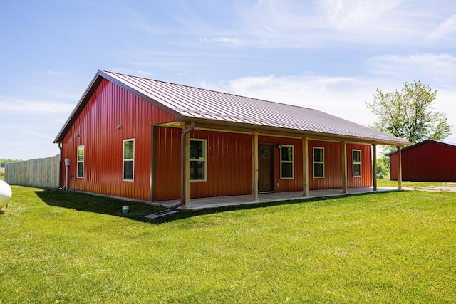 1674 Brock Rd NE, Bloomingburg, OH 43106 - back of house featuring a standing seam roof and metal roof