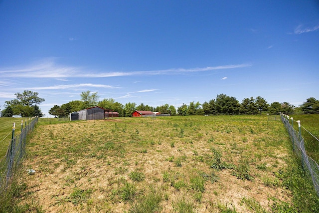 1674 Brock Rd NE, Bloomingburg, OH 43106 - view of yard with a view of countryside, a pole building, and an outbuilding
