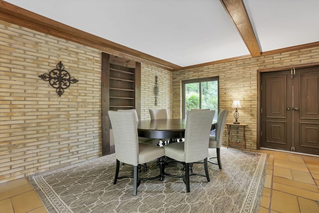 13115 Jack Run Rd, Rockbridge, OH 43149 - tiled dining room with beam ceiling and brick wall