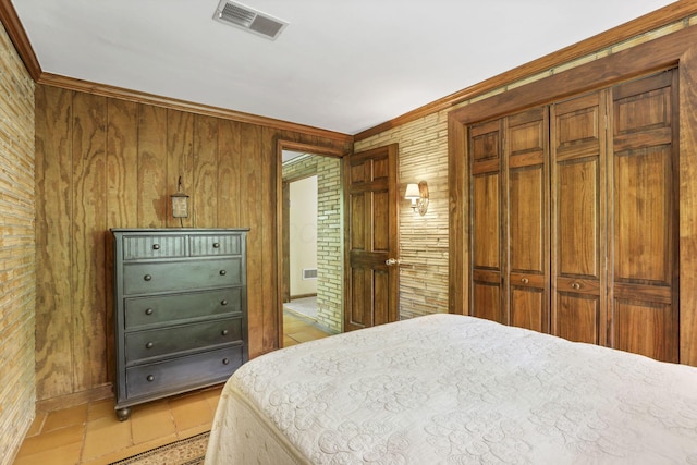 13115 Jack Run Rd, Rockbridge, OH 43149 - bedroom featuring wood walls, crown molding, and a closet