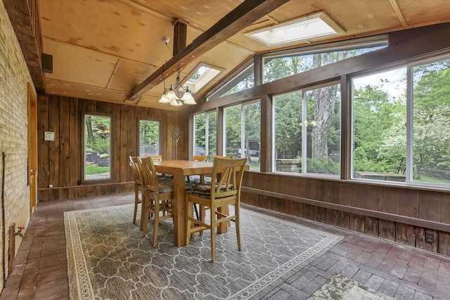 13115 Jack Run Rd, Rockbridge, OH 43149 - dining area with wood walls, a chandelier, and wood ceiling