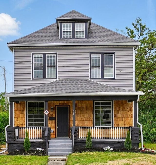 525 Saint Clair Ave, Columbus, OH 43203 - traditional style home featuring covered porch and roof with shingles