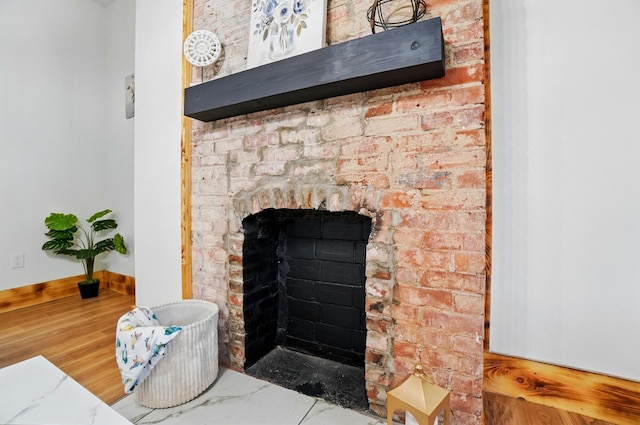 525 Saint Clair Ave, Columbus, OH 43203 - detailed view of a fireplace and baseboards
